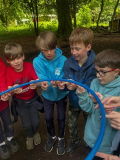 Everyone has arrived safely! Group Three testing their problem solving skills and teamwork!